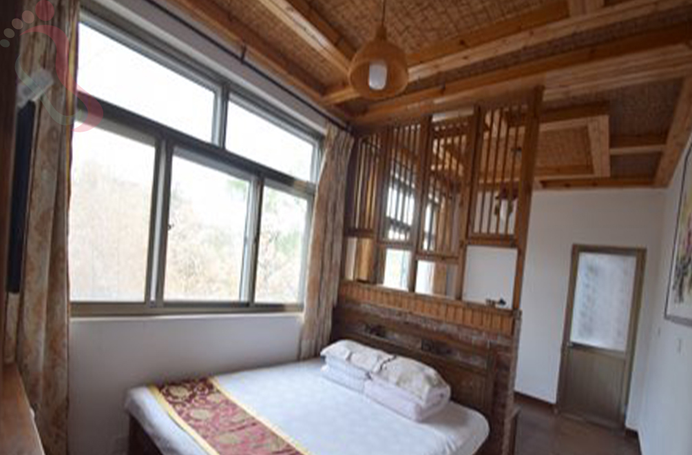 天津蓟州区郭家沟朝陽村舍房间图片1