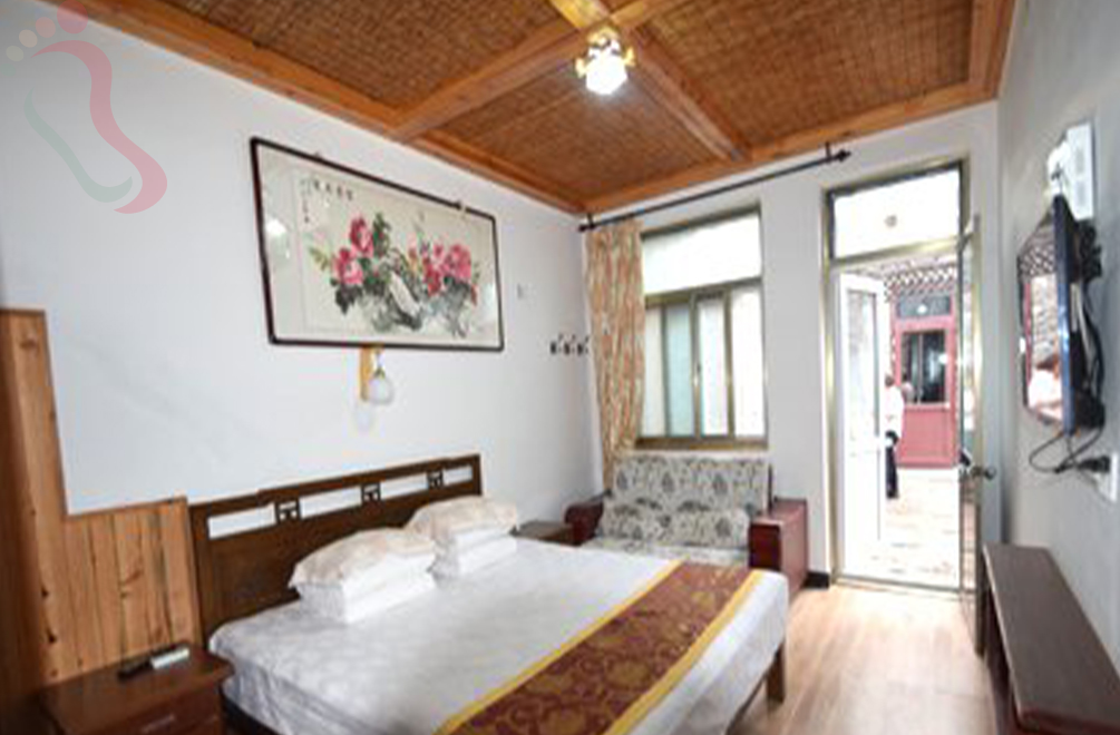 天津蓟州区郭家沟朝陽村舍房间图片3