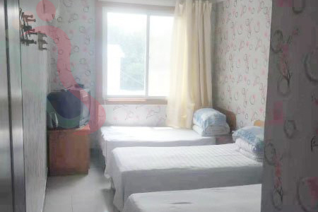 獐子岛嘉琪山庄房间图片3